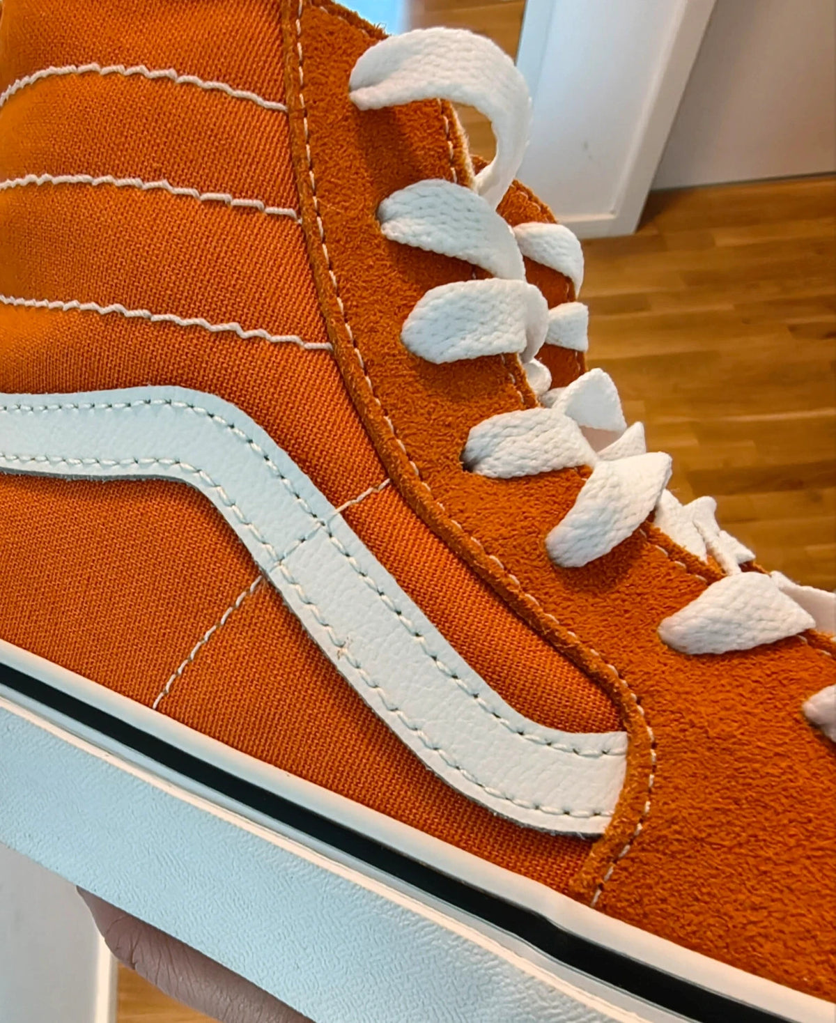 VANS Sk8-Hi Tapered trainers orange marmalade with white laces and signature side stripe.