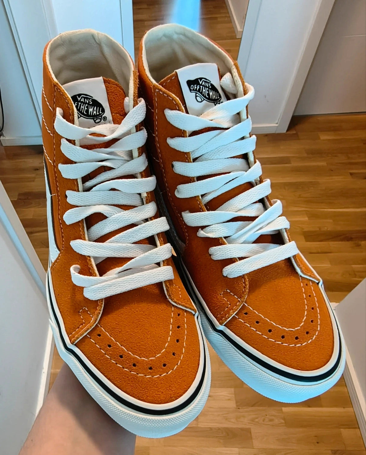 VANS Sk8-Hi Tapered trainers orange marmalade with white laces and signature side stripe.