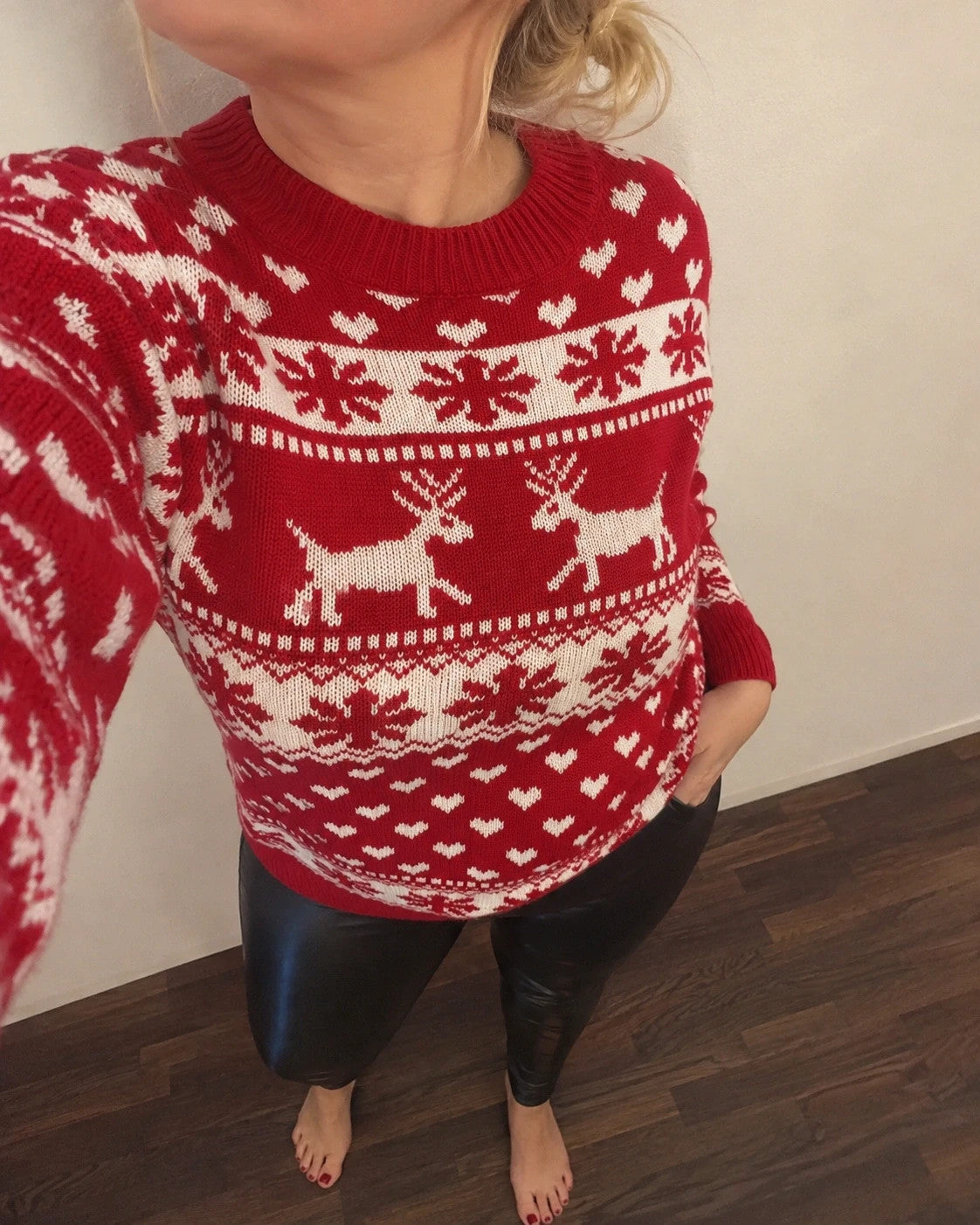 SheIn red and white Christmas sweater with reindeer, snowflakes, and ribbed cuffs.