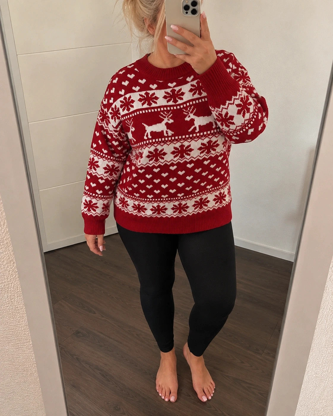 SheIn red and white Christmas sweater with reindeer, snowflakes, and ribbed cuffs.
