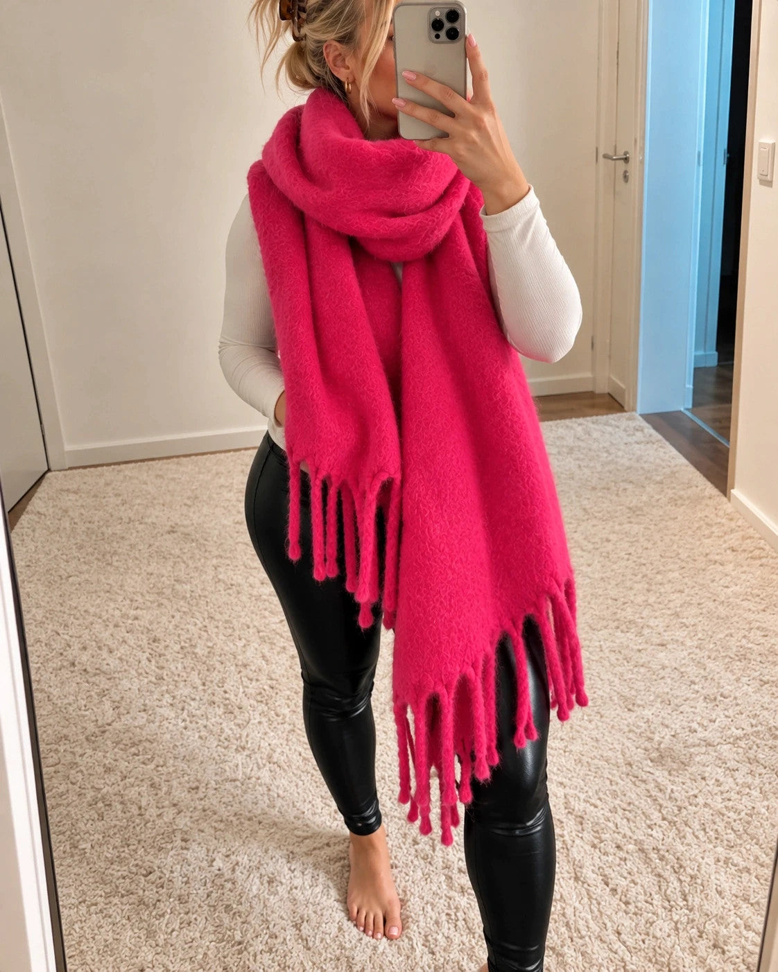 XXL pink fuchsia oversized scarf with long decorative fringes and soft fluffy texture.