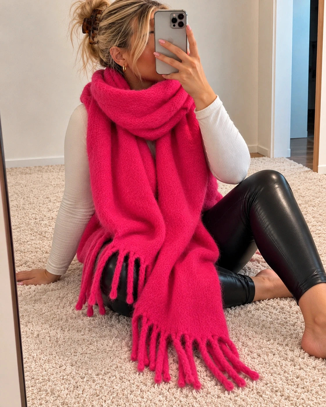XXL pink fuchsia oversized scarf with long decorative fringes and soft fluffy texture.
