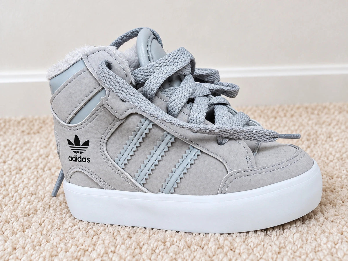 Adidas high top sneakers grey with soft lining, white rubber sole, and logo detail.