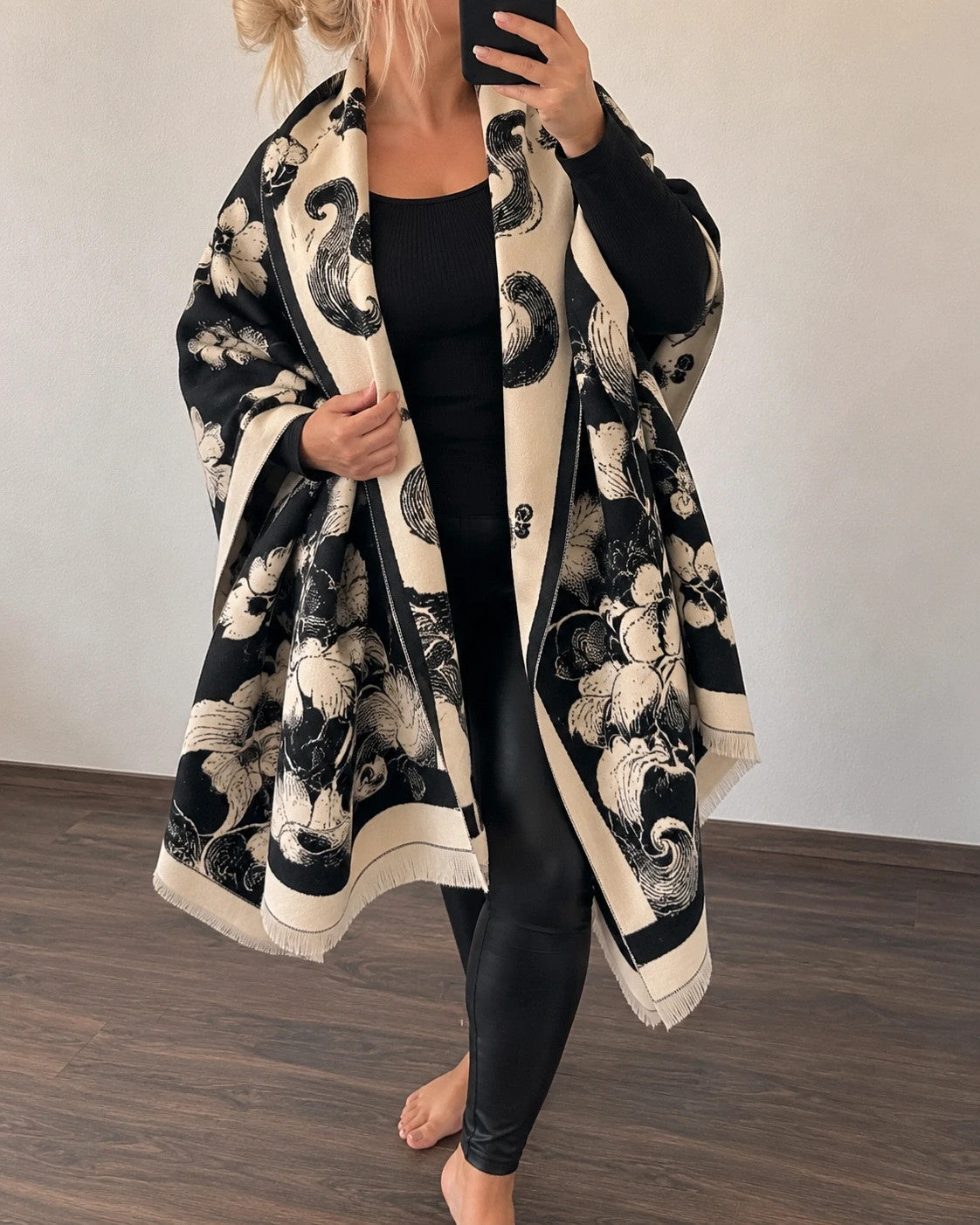 Creme black and cream shawl with floral pattern, soft polyester fabric.