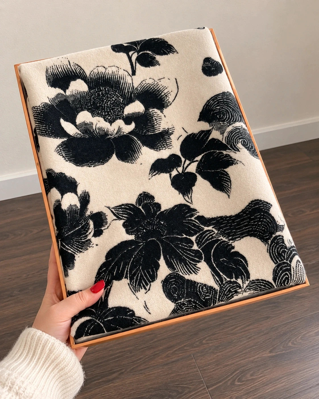 Creme black and cream shawl with floral pattern, soft polyester fabric.