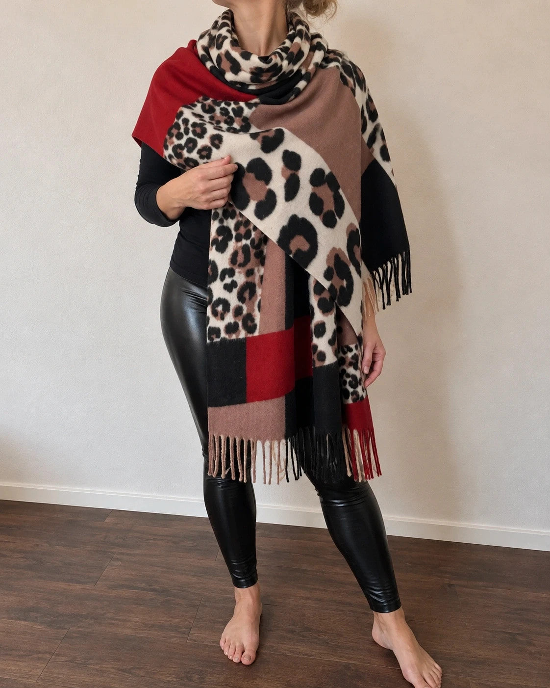 Muster multi shawl leopard print with fringe in red, beige, brown, cream, and black.
