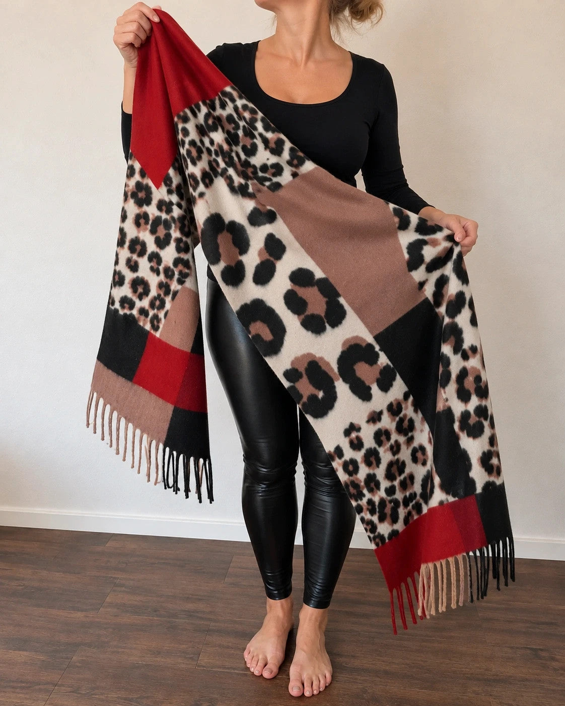 Muster multi shawl leopard print with fringe in red, beige, brown, cream, and black.