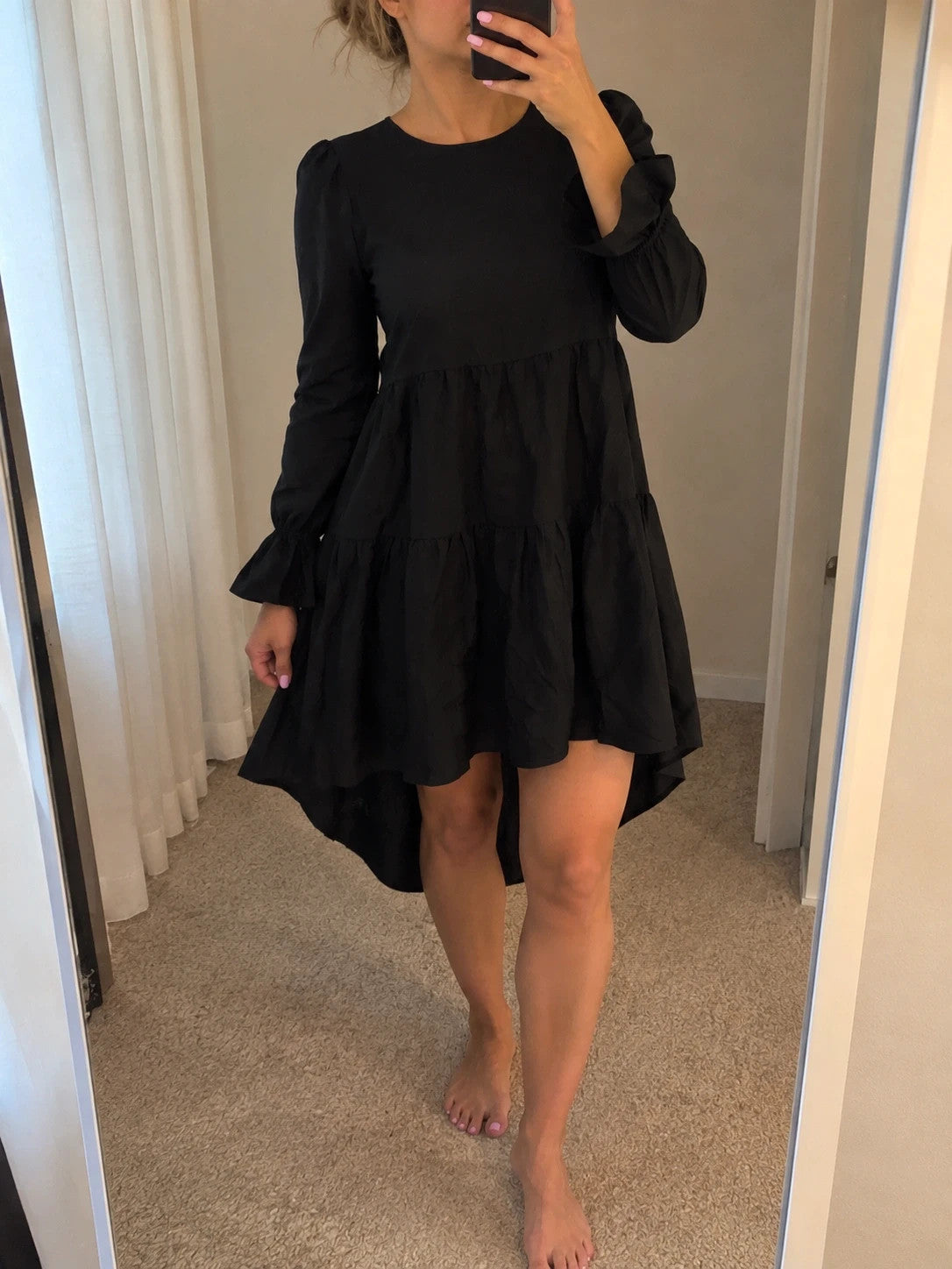 SheIn black oversized A-line dress with layered ruffle sleeves and asymmetrical hem.
