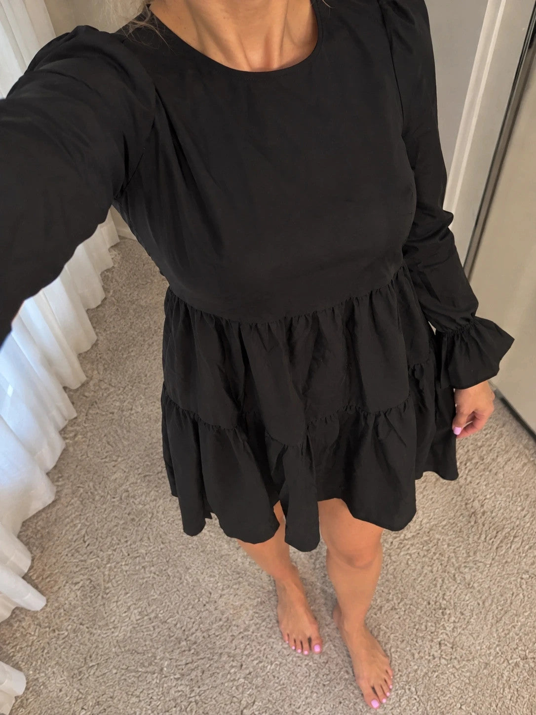 SheIn black oversized A-line dress with layered ruffle sleeves and asymmetrical hem.