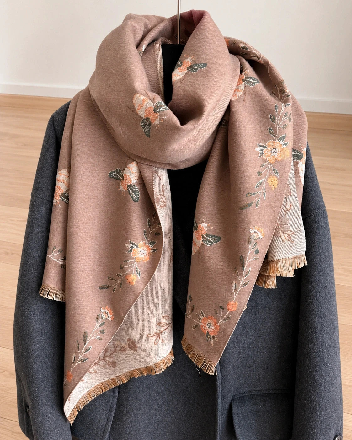 Beige shawl with brown bee and flower pattern, reversible design, fringed edges.