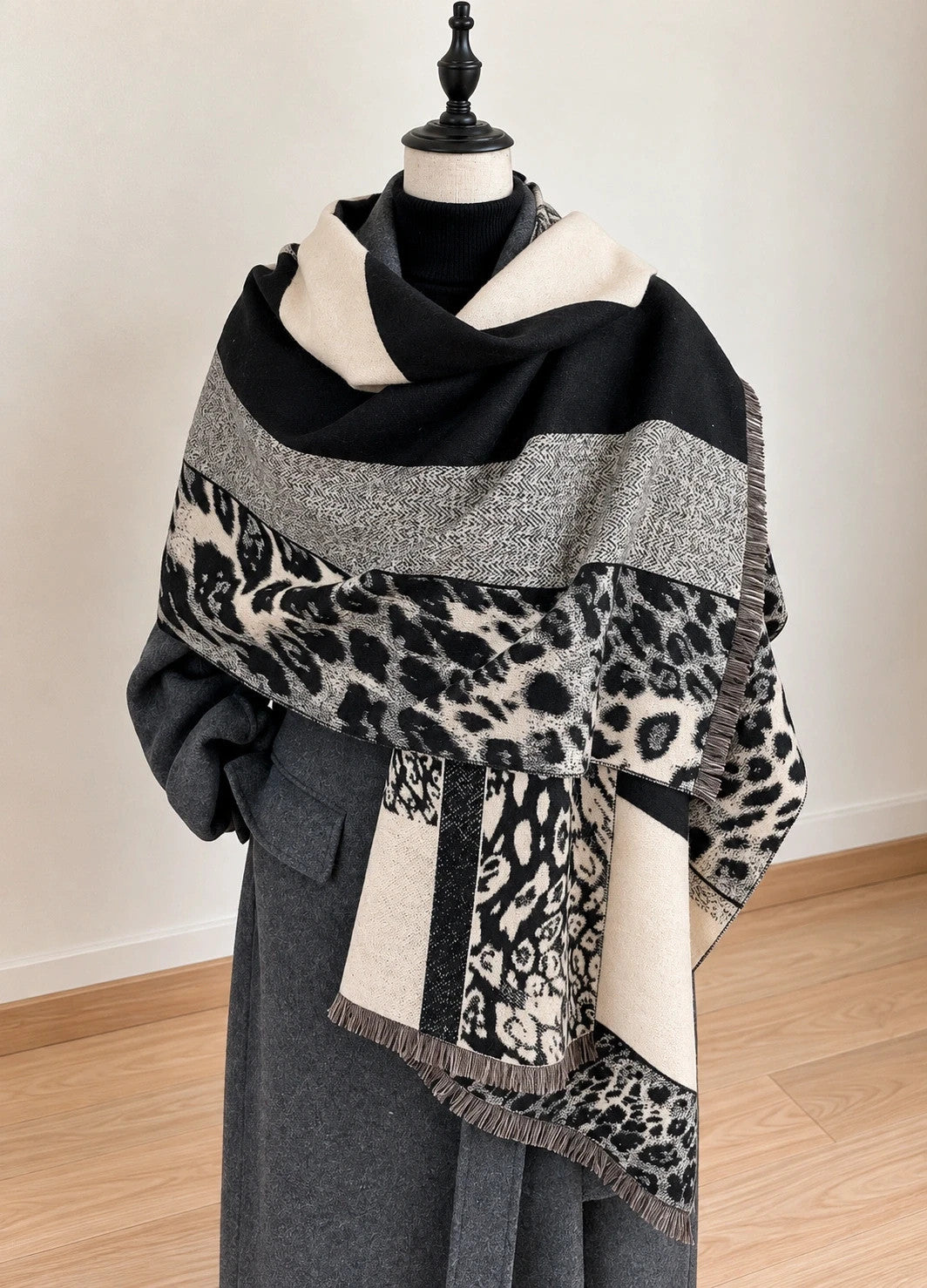 beige shawl black cream leopard print geometric patterns with fringe details