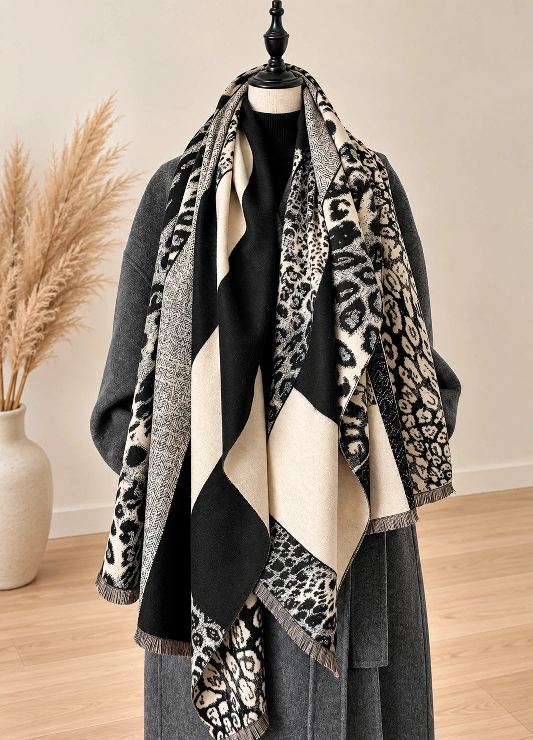 beige shawl black cream leopard print geometric patterns with fringe details