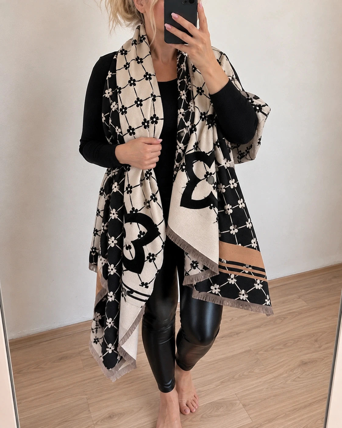 Creme shawl black cream beige floral pattern with decorative camel accents and fringes.