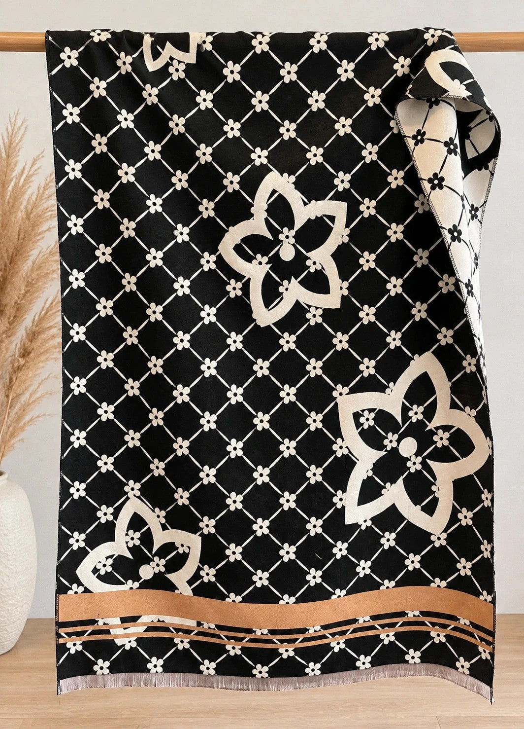 Creme shawl black cream beige floral pattern with decorative camel accents and fringes.