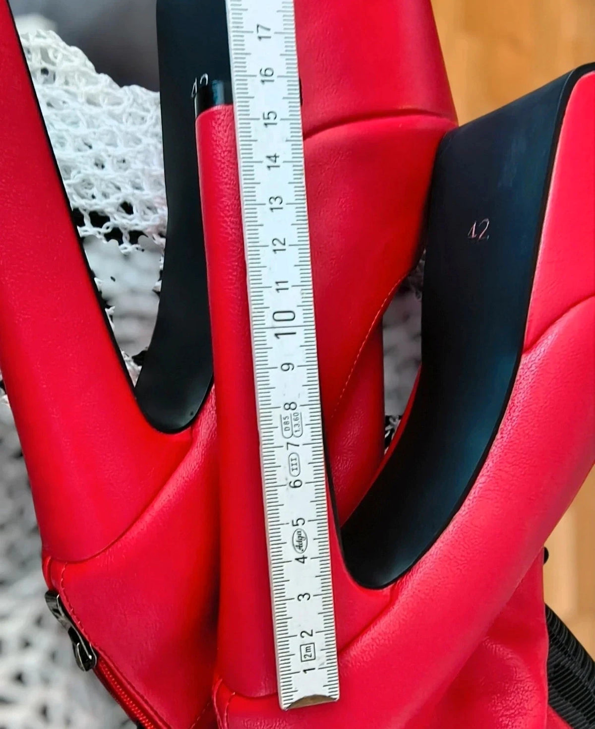High Heels red overknee boots with high block heels and synthetic material.