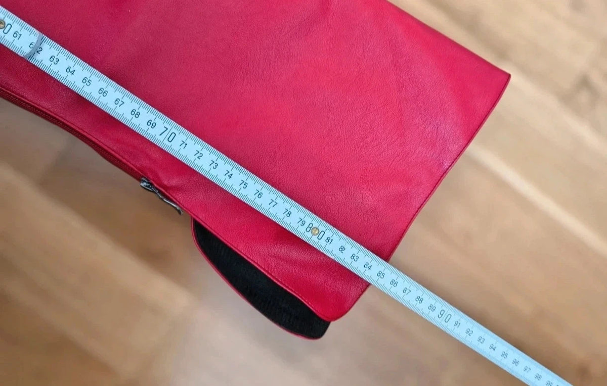 High Heels red overknee boots with high block heels and synthetic material.