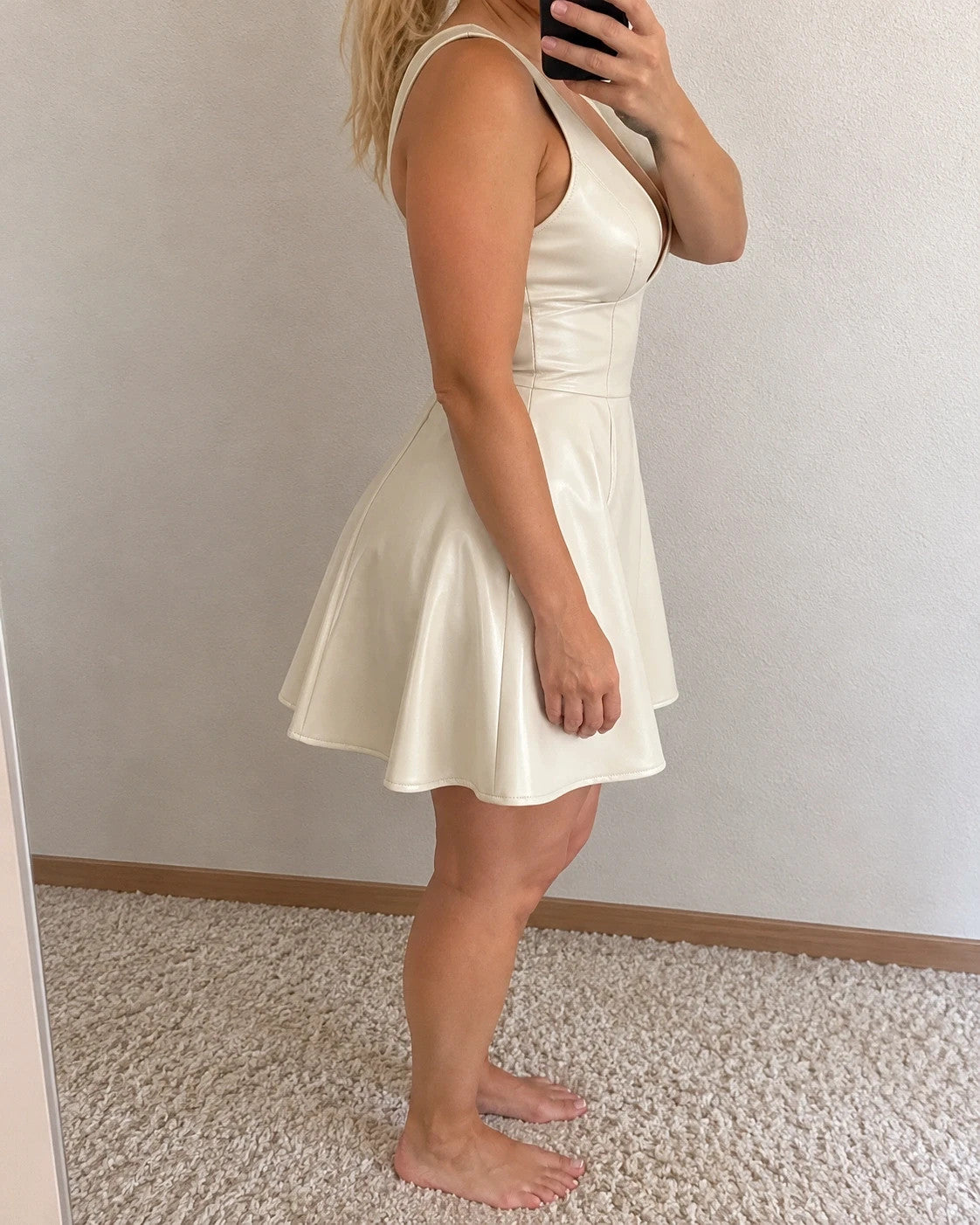 Creme bandage dress cream matte leather look deep V-neck backless with zippers.