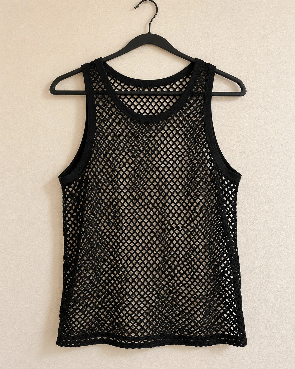 Stoff black mesh tank top with round neckline and wide straps, featuring open hole pattern.