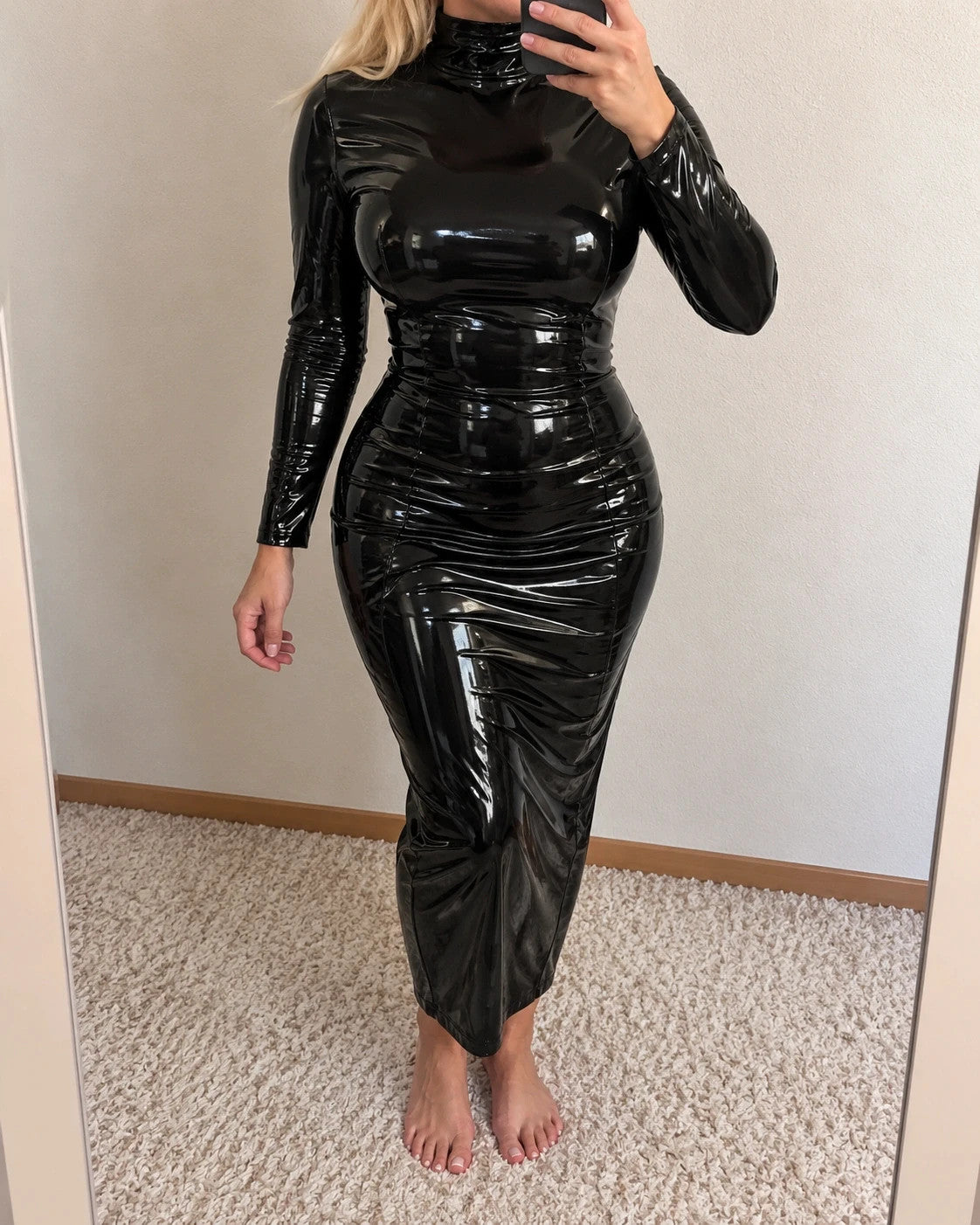 Grosse black wetlook maxi dress with long sleeves and fitted silhouette.