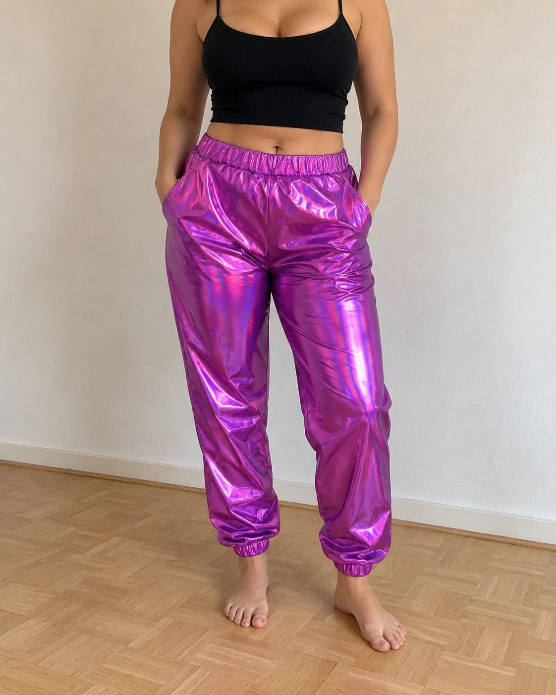 Lila purple pants with holographic metallic sheen and elastic waistband, size L.