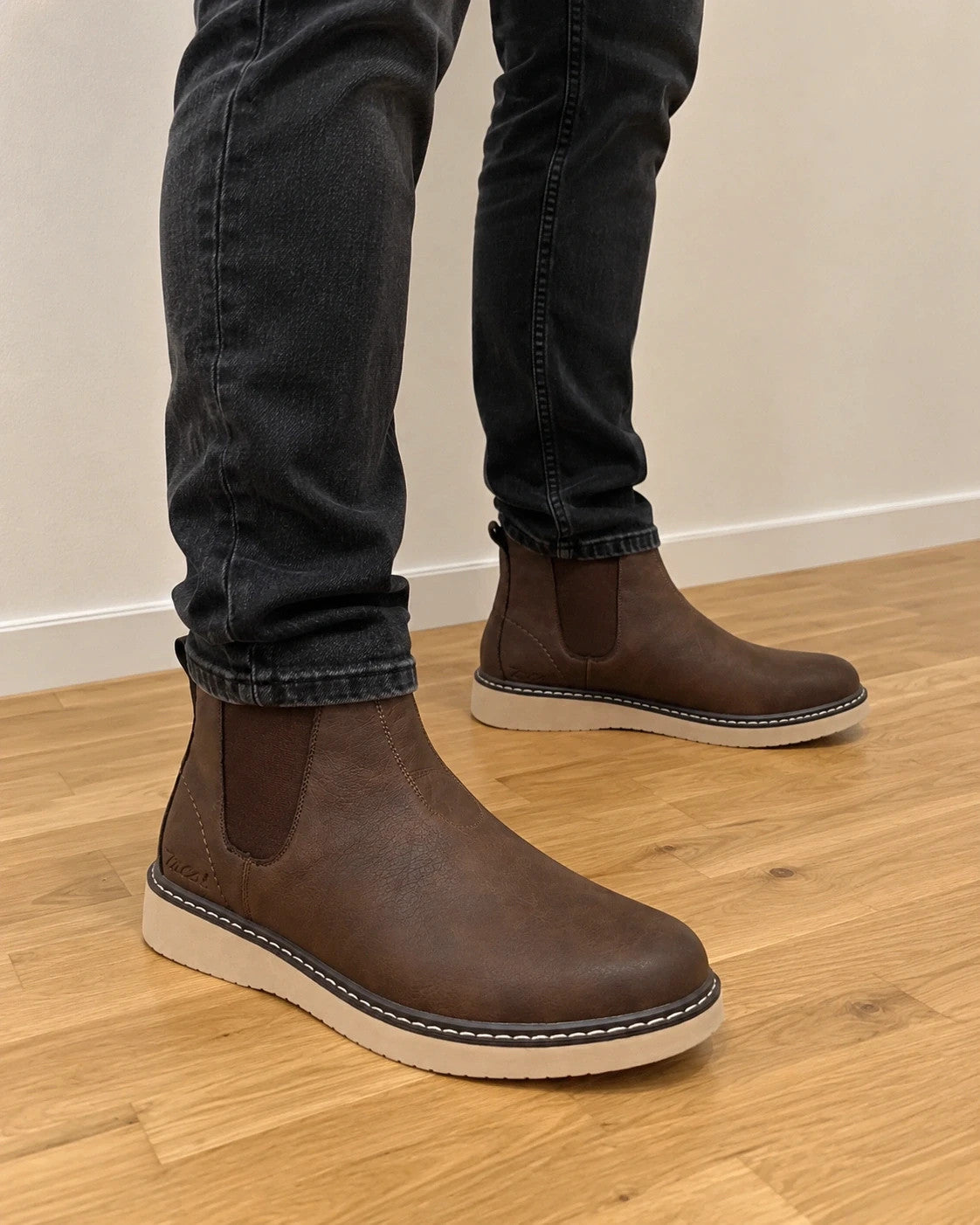 MCS brown winter boots with elastic side panels and beige contrast sole.