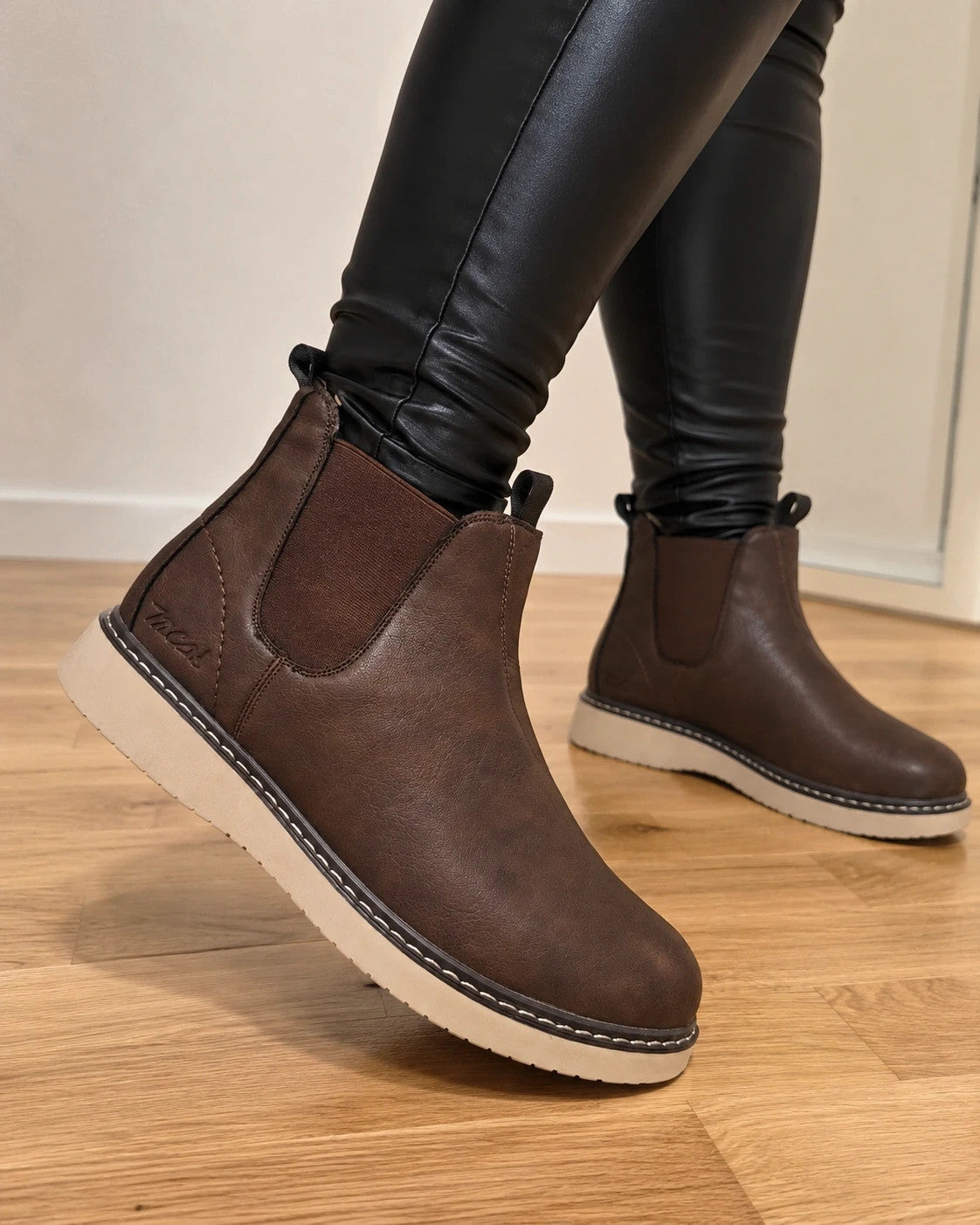 MCS brown winter boots with elastic side panels and beige contrast sole.