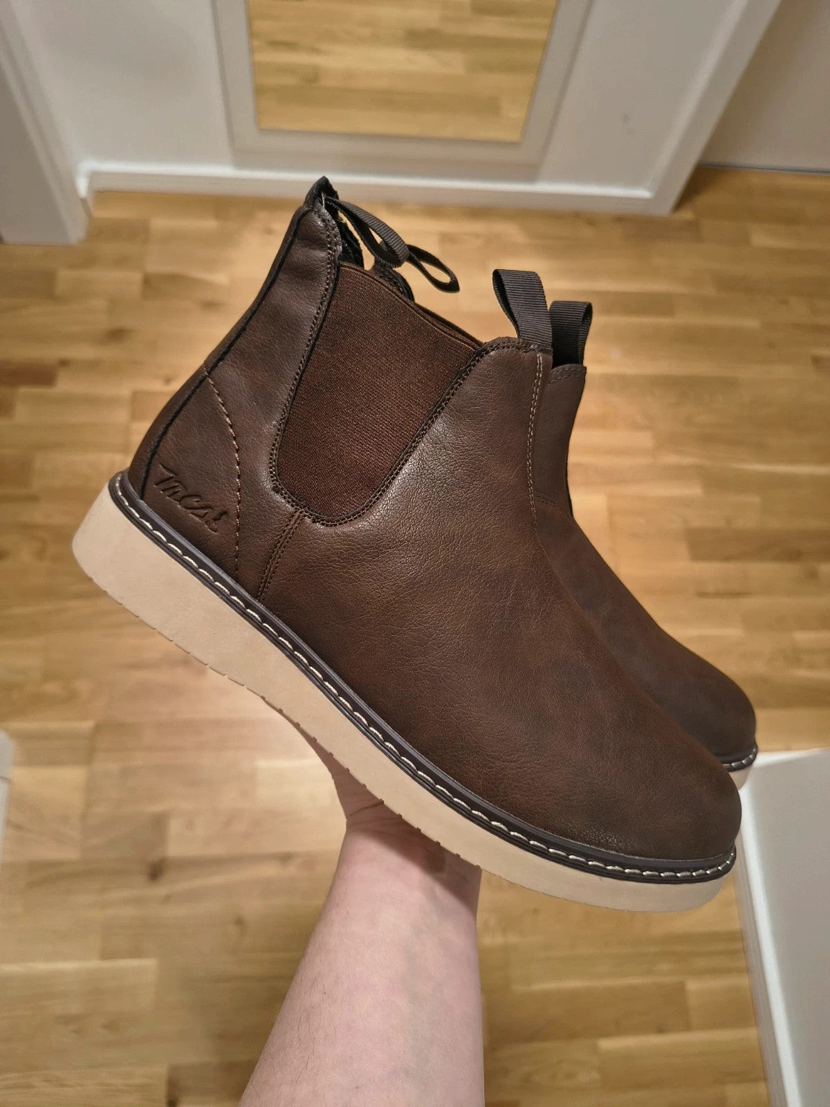 MCS brown winter boots with elastic side panels and beige contrast sole.