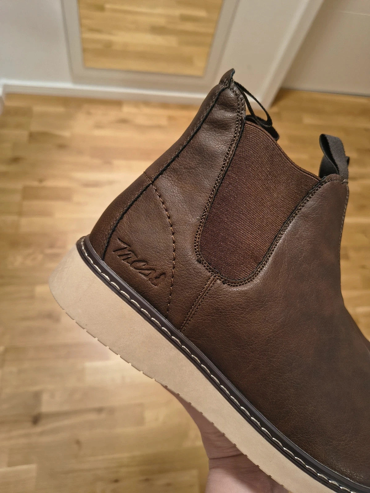 MCS brown winter boots with elastic side panels and beige contrast sole.