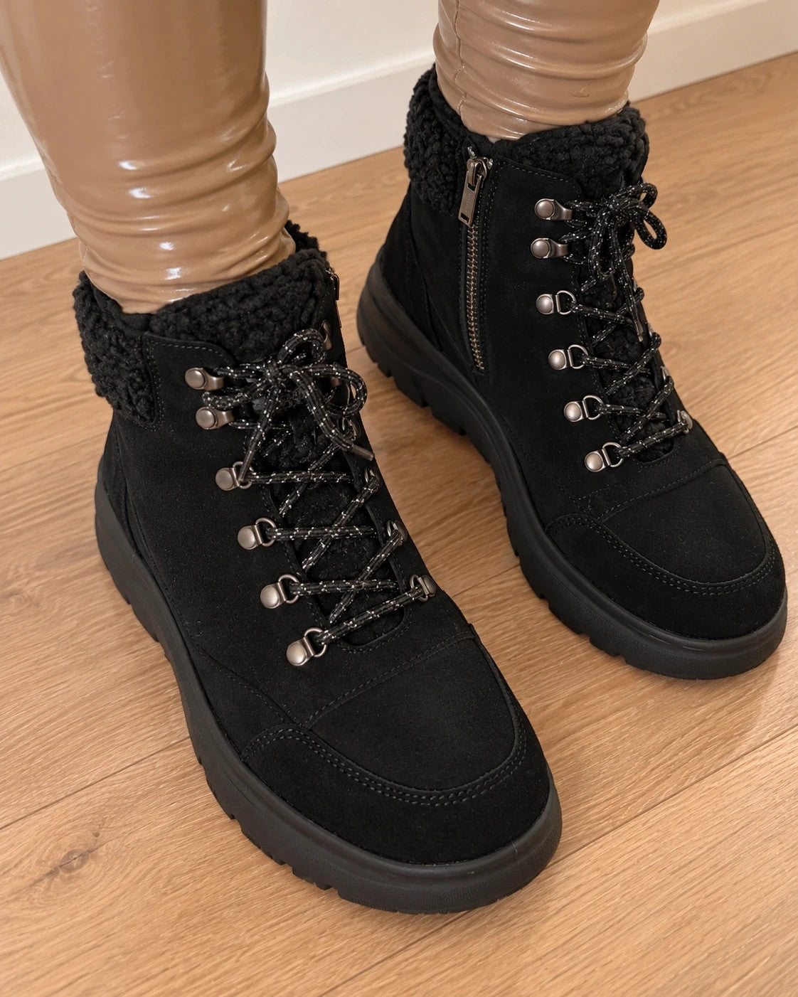 Skechers black winter boots suede with Sherpa lining and side zipper detail.