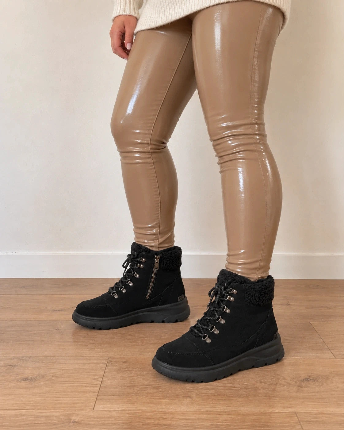 Skechers black winter boots suede with Sherpa lining and side zipper detail.