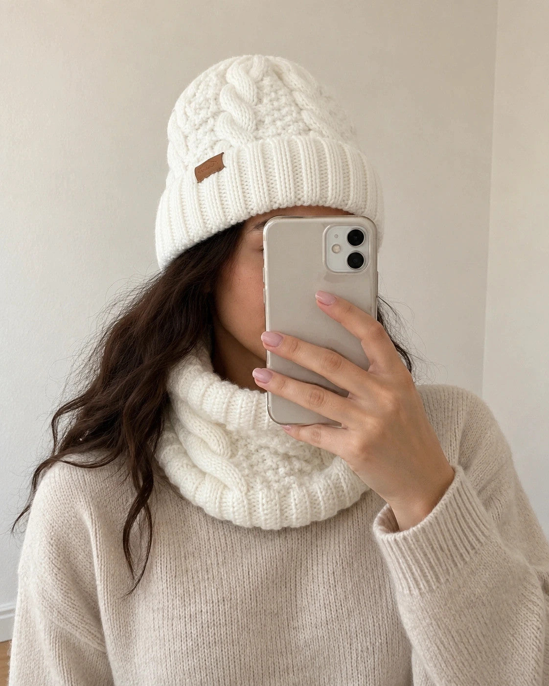 Off-White cream hat and neck warmer set with cable knit pattern, soft polyester material.