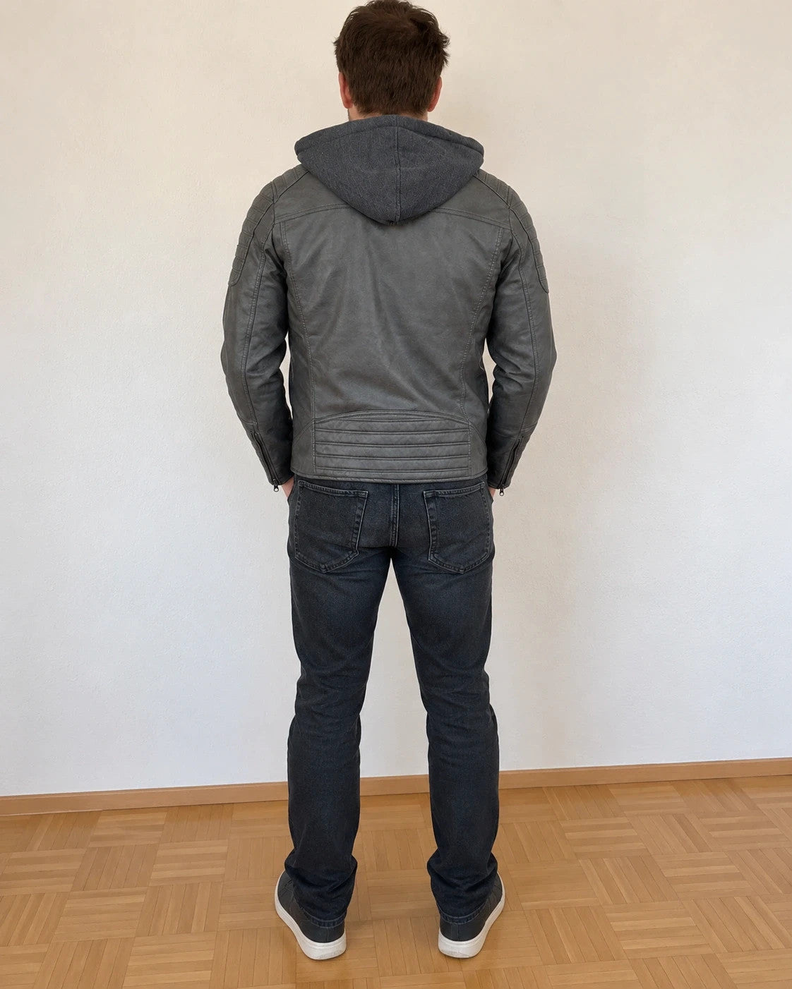 Indicode grey biker jacket with logo, padded hood, and quilted shoulder details.