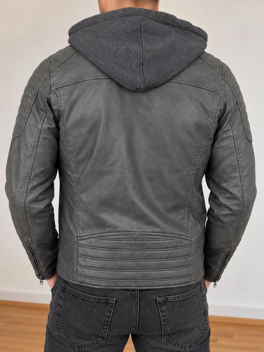 Indicode grey biker jacket with logo, padded hood, and quilted shoulder details.