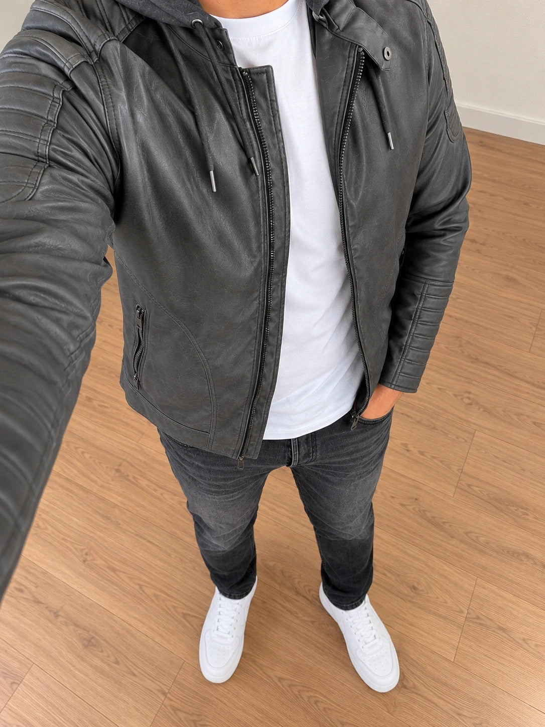 Indicode grey biker jacket with logo, padded hood, and quilted shoulder details.