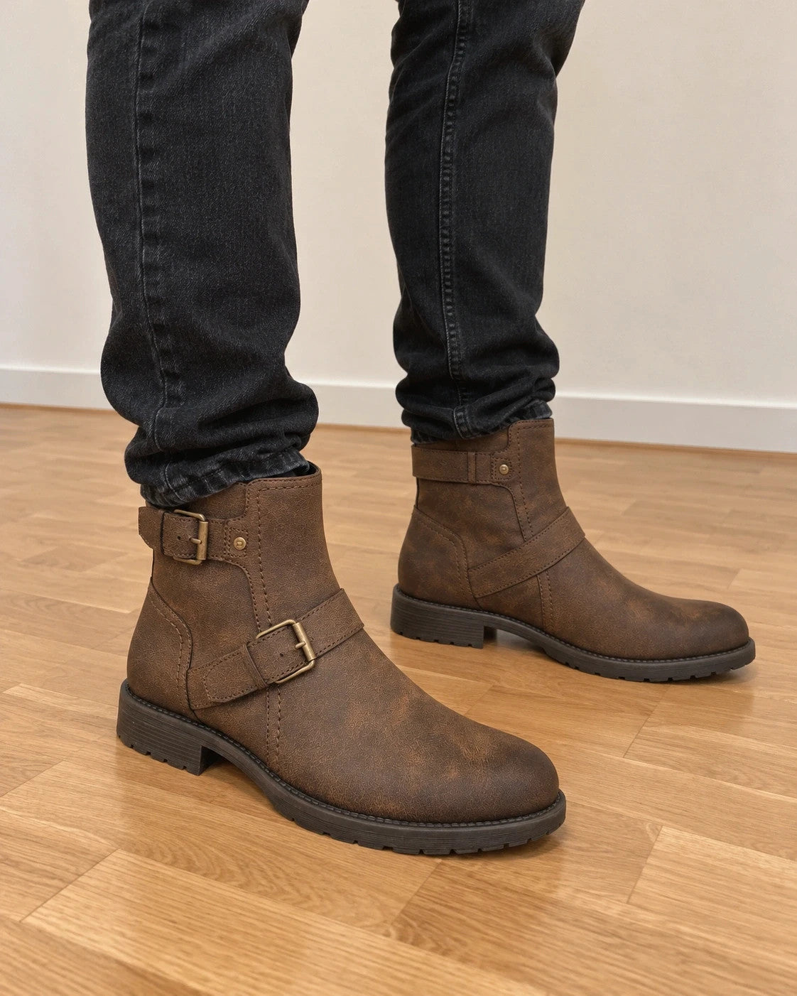 Deakins brown biker boots with antique metal buckles and side zipper, robust leather look.