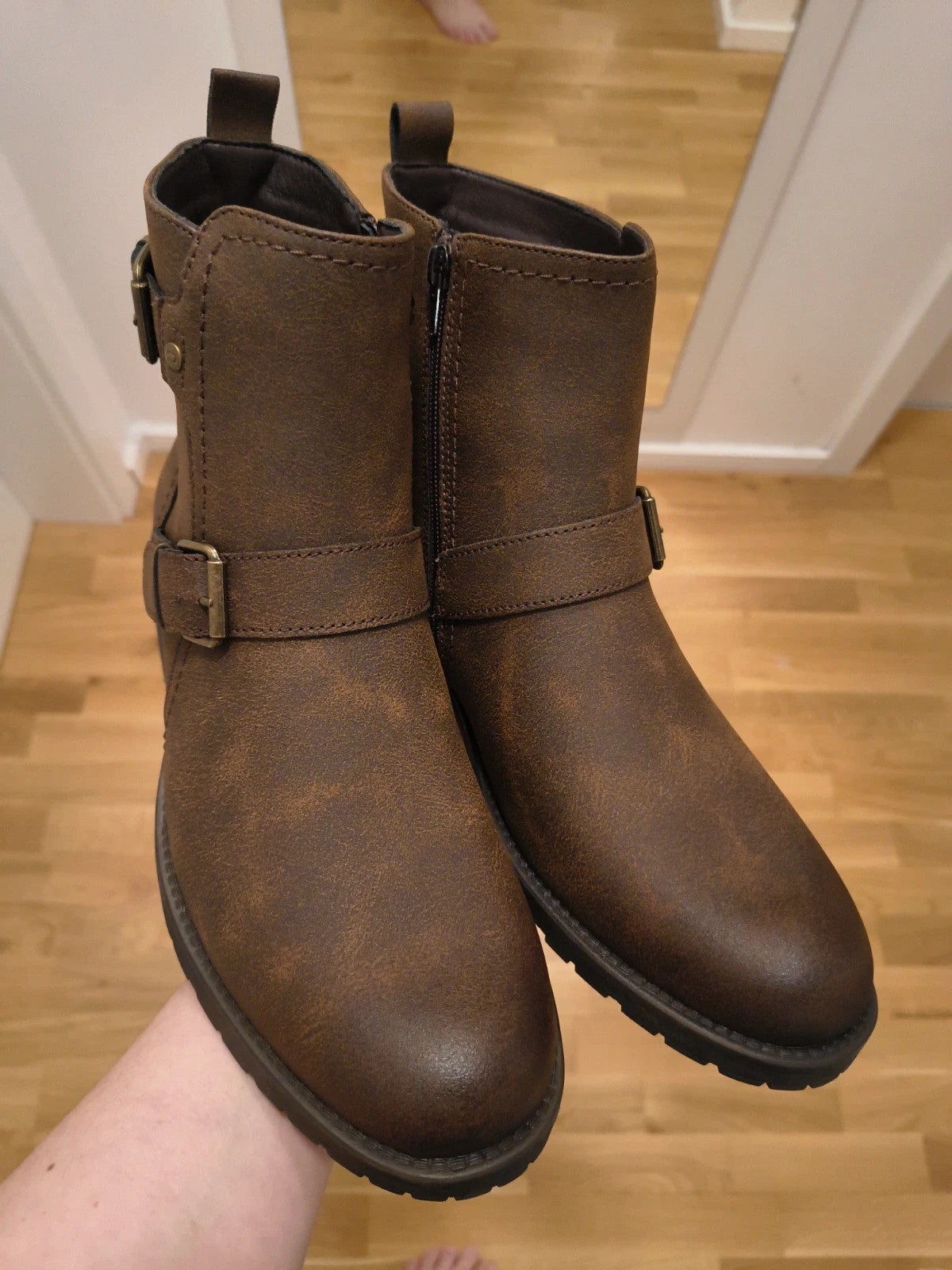 Deakins brown biker boots with antique metal buckles and side zipper, robust leather look.