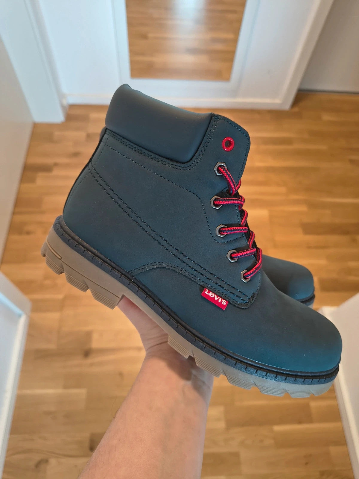 Levi's blue Newforrest boots with red laces and padded collar, size 38.
