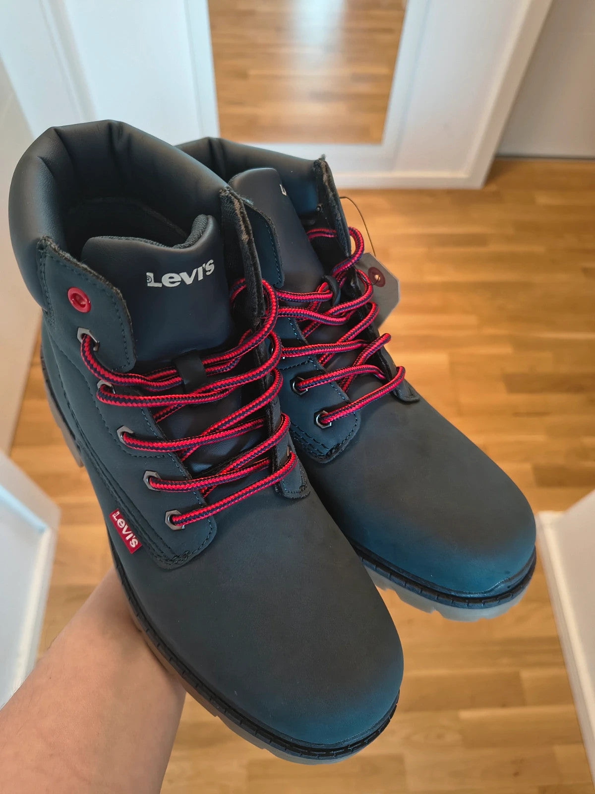 Levi's blue Newforrest boots with red laces and padded collar, size 38.