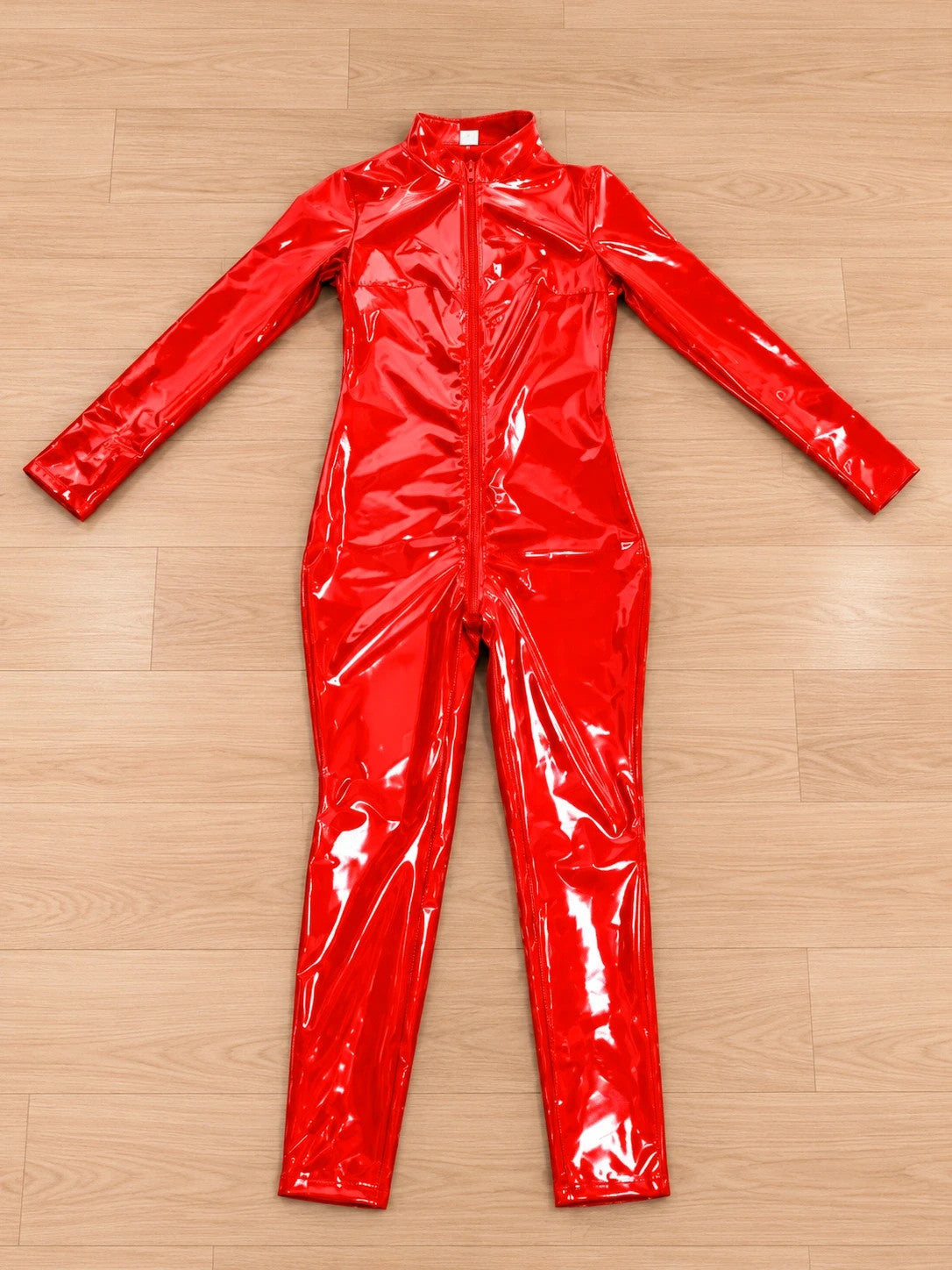 L'ange red jumpsuit with fitted silhouette and stand-up collar, long sleeves and legs.