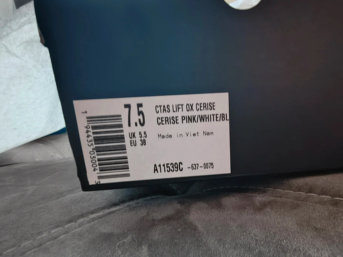 Converse pink Chuck Taylor All Star Lift Platform sneakers with white sole and logo.