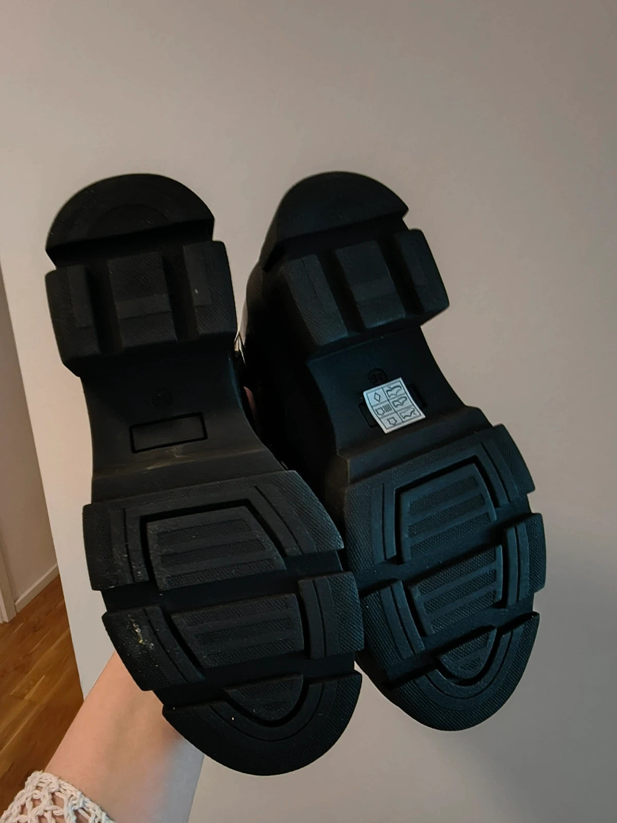 Copenhagen Shoes black and green leather Chelsea boots with crocodile pattern and elastic side inserts.