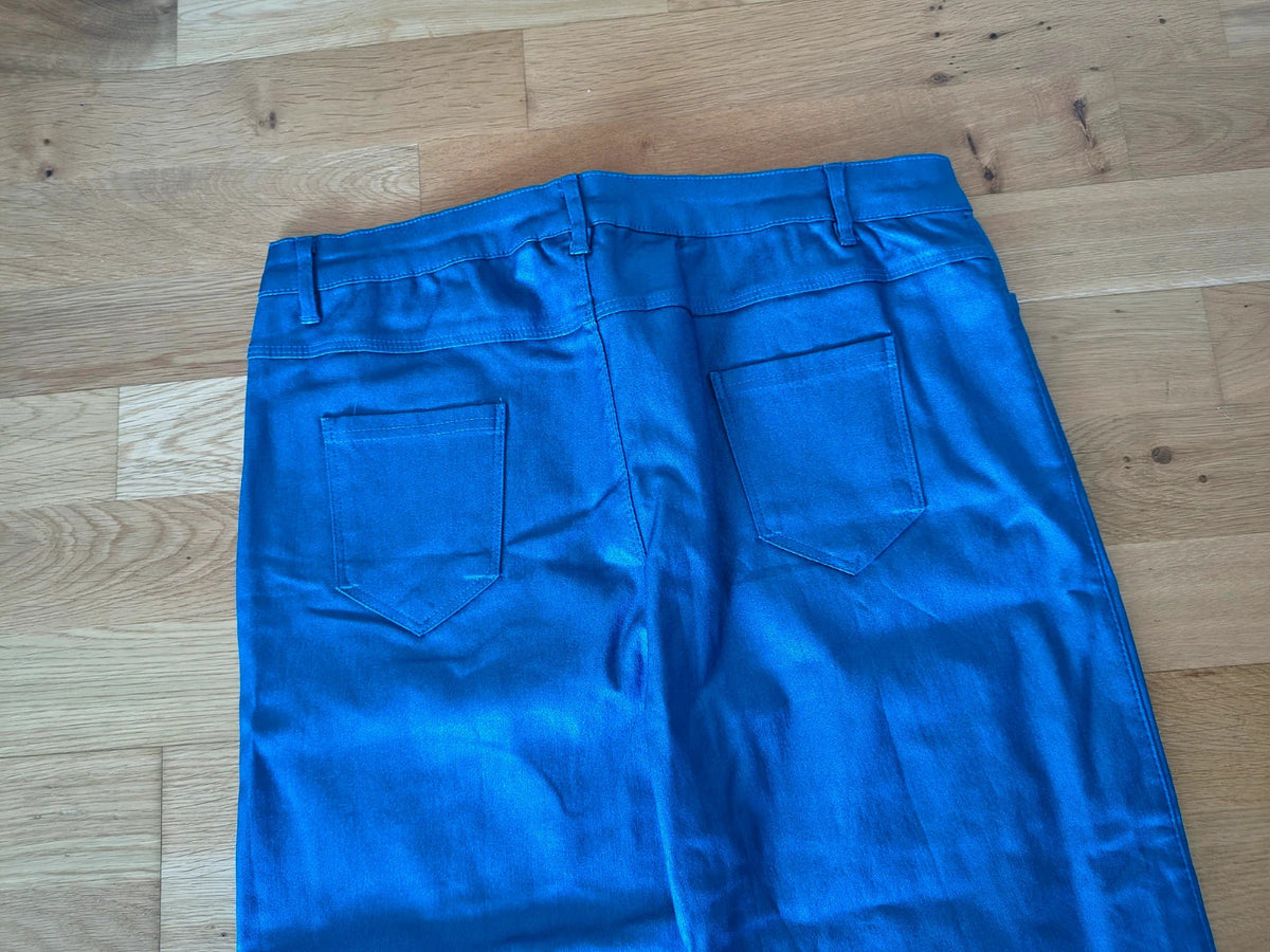 Bootcut blue bootcut trousers with shiny finish, fitted hips, and flared legs.