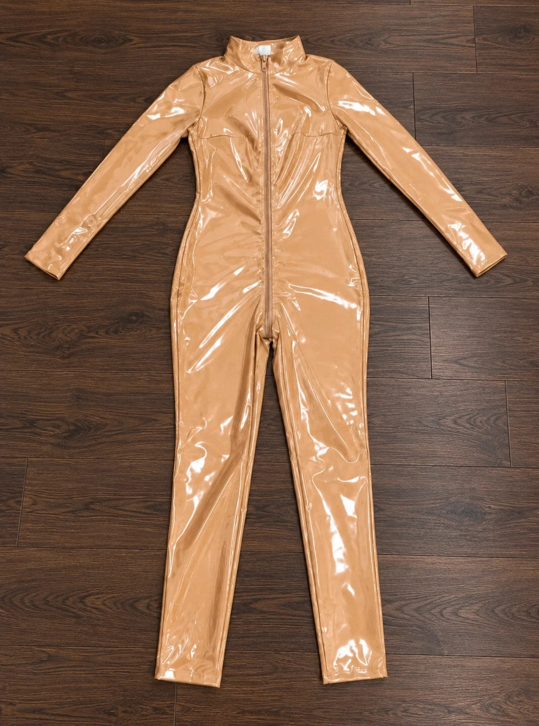 Beige jumpsuit with high collar, long sleeves, and glossy finish, size XL.