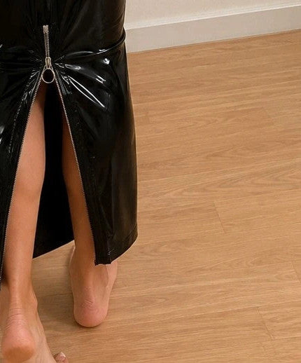 REI black two-piece set shiny wetlook finish with back zipper and fitted silhouette.