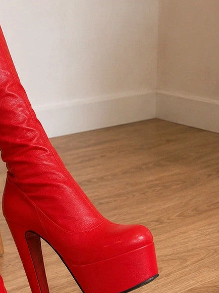 ALS red overknee plateau boots with thick stiletto heel and soft interior.