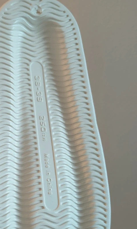 Slipper cream slides synthetic material, size 38, minimalistic design.