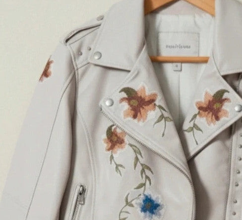 Brand New beige and orange biker jacket with floral pattern in synthetic material.