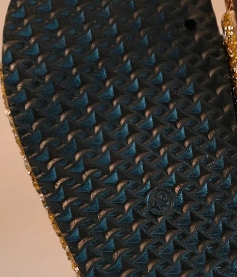 ALS gold slides with glitter, synthetic material, and unique sparkling design.