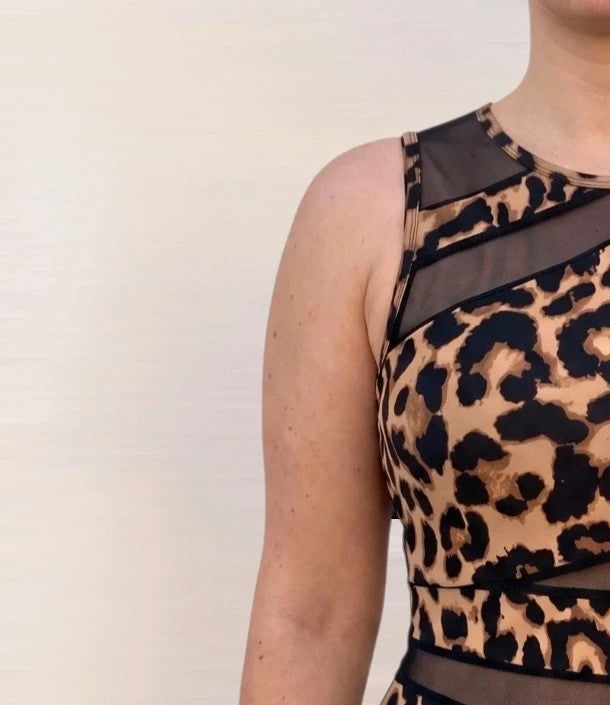 SheIn black and brown leopard print romper synthetic material with animal pattern.