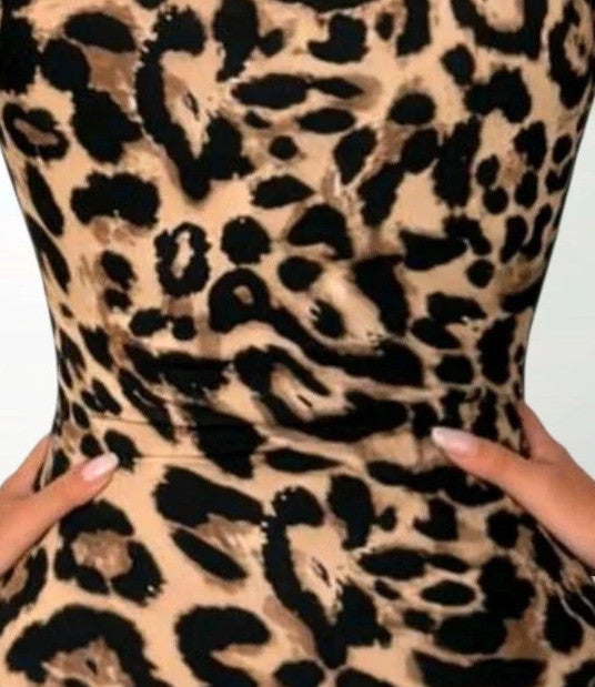 SheIn black and brown leopard print romper synthetic material with animal pattern.